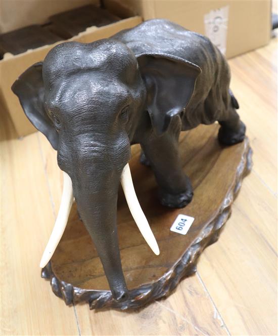 A Japanese Meiji bronze elephant, signed, length 42cm